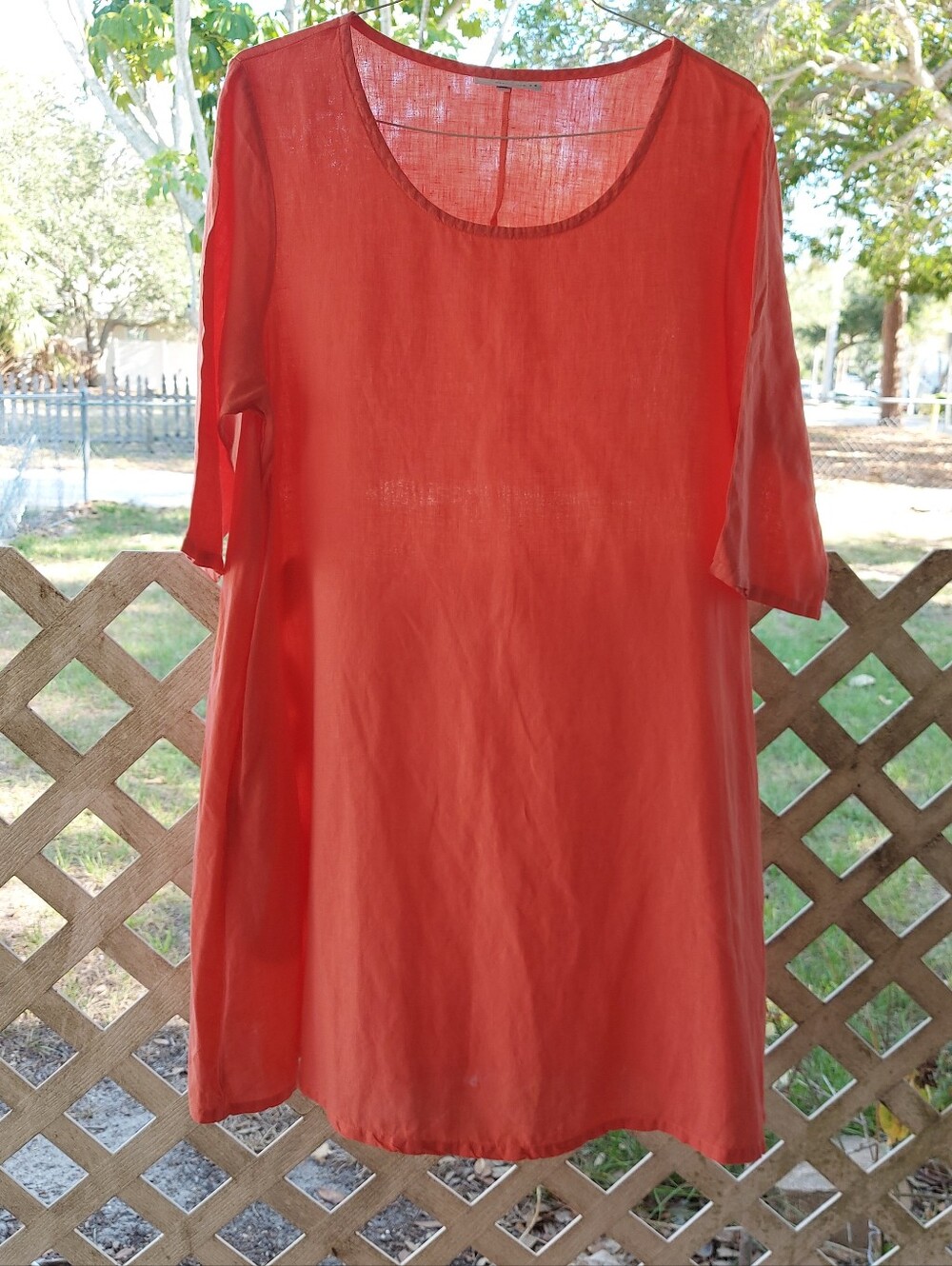 Coral-pink tunic dress by the American brand Bryn Walker — 100% linen.